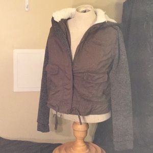 A gray and green jean jacket